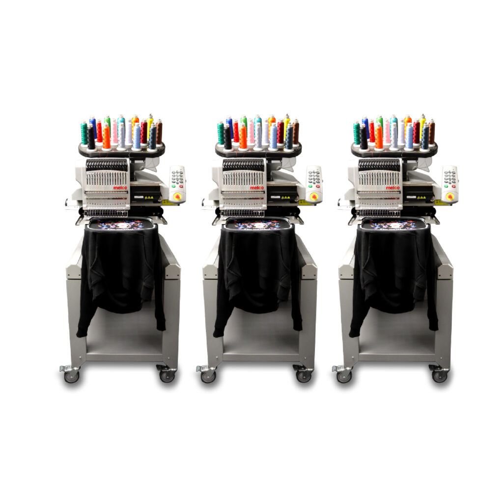 Melco EMT16X Three Head Embroidery Machine with garments Melco EMT16X Three Head Embroidery Machine with garments