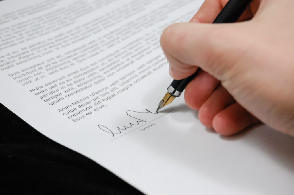 Signing a letter with Ink Pen Signing a letter with Ink Pen