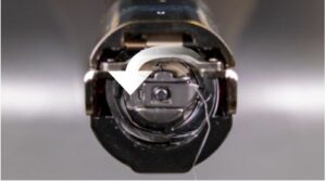 Inserting Bobbin case for melco Inserting Bobbin case for melco