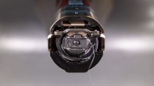 Inserting Bobbin case for melco Inserting Bobbin case for melco