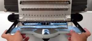 Melco Attaching Hoop Arms Demonstration Melco Attaching Hoop Arms Demonstration