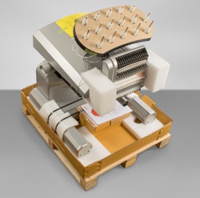 Melco Embroidery Machine in packaging Melco Embroidery Machine in packaging